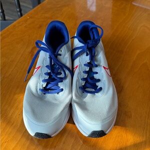 White and Blue Athletic Shoes